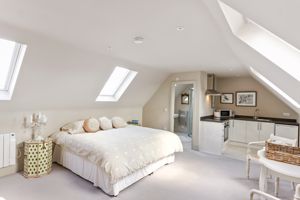 Self contained studio above double garage- click for photo gallery